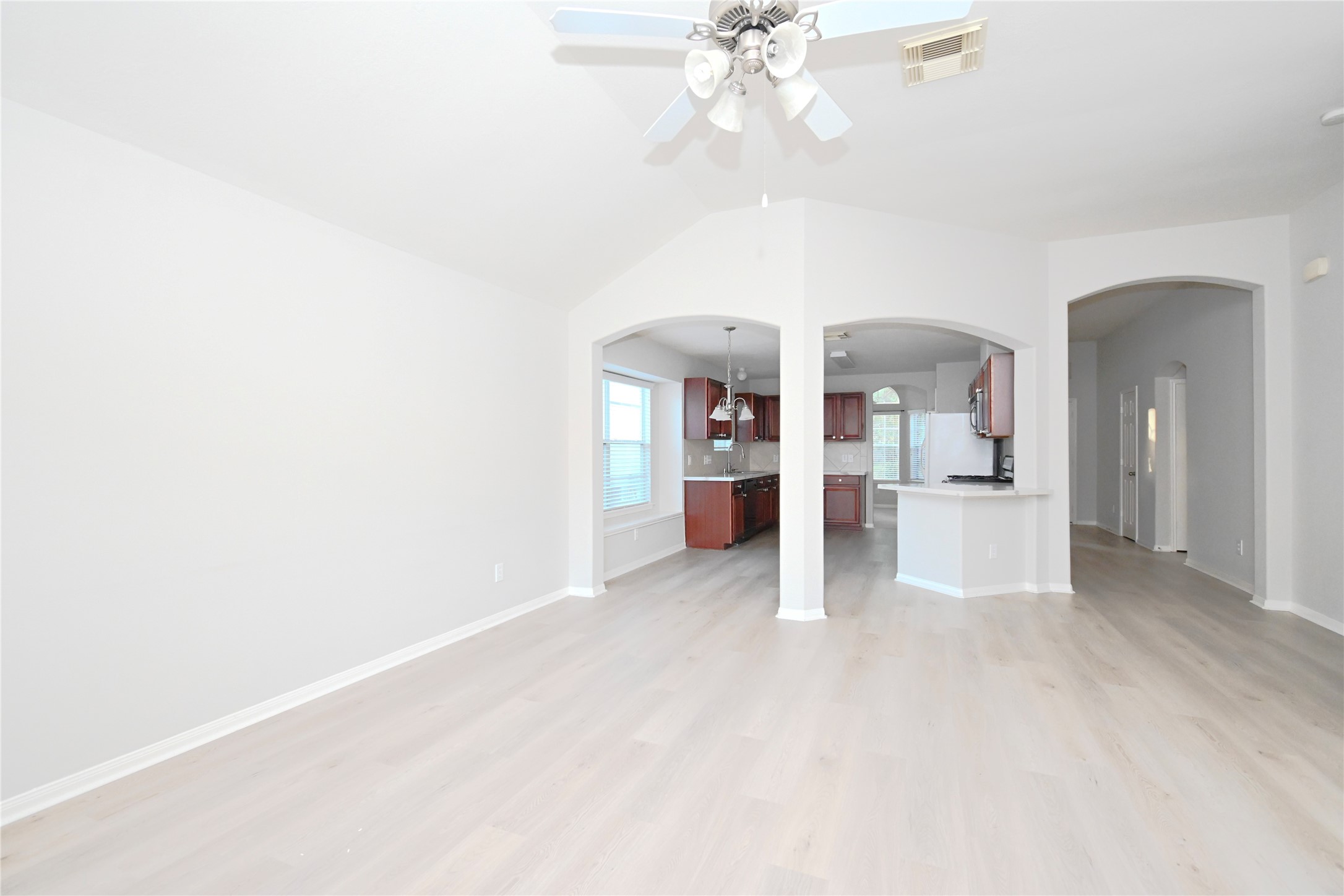3111 Myrtle Ranch Drive Katy, TX 77494 - Photo 2 of 27 a view of a kitchen with furniture and an empty room