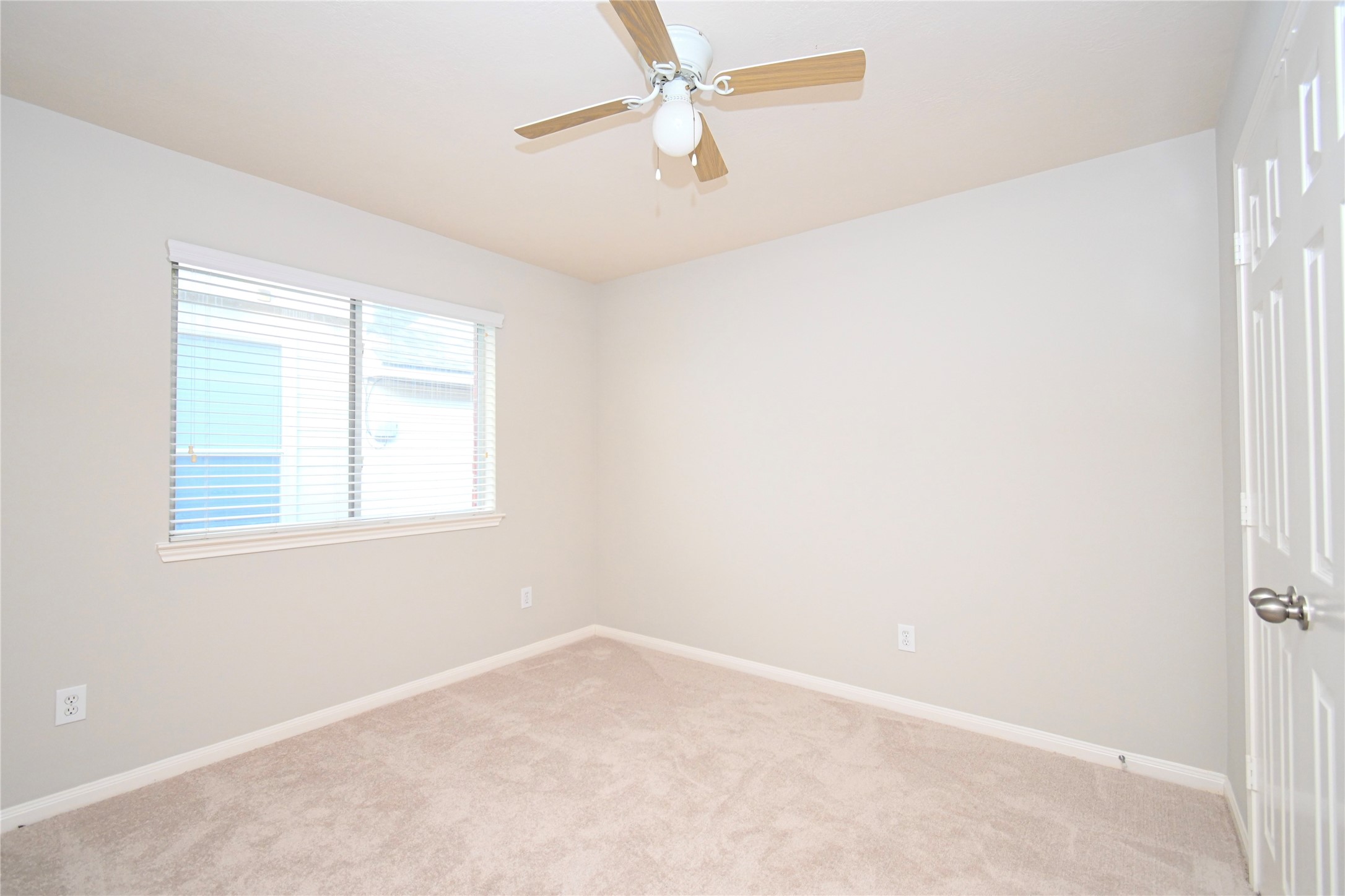 3111 Myrtle Ranch Drive Katy, TX 77494 - Photo 22 of 27 an empty room with a window and a fan
