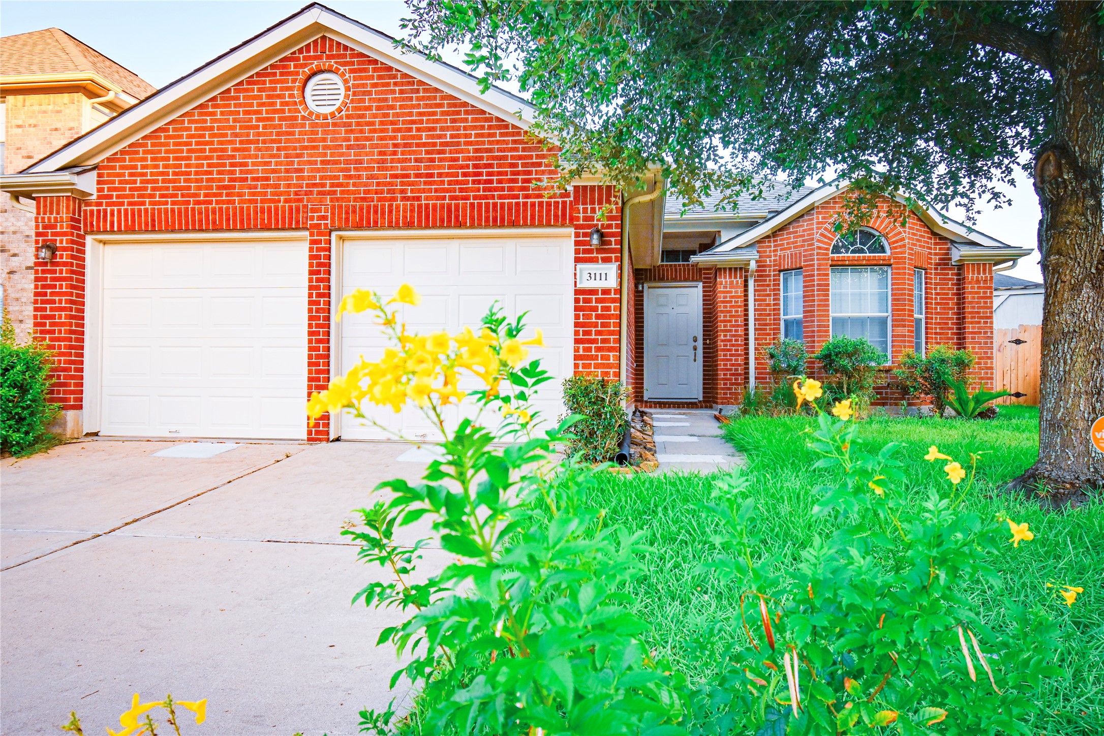 3111 Myrtle Ranch Drive Katy, TX 77494 - Photo 26 of 27 a front view of a house with garden