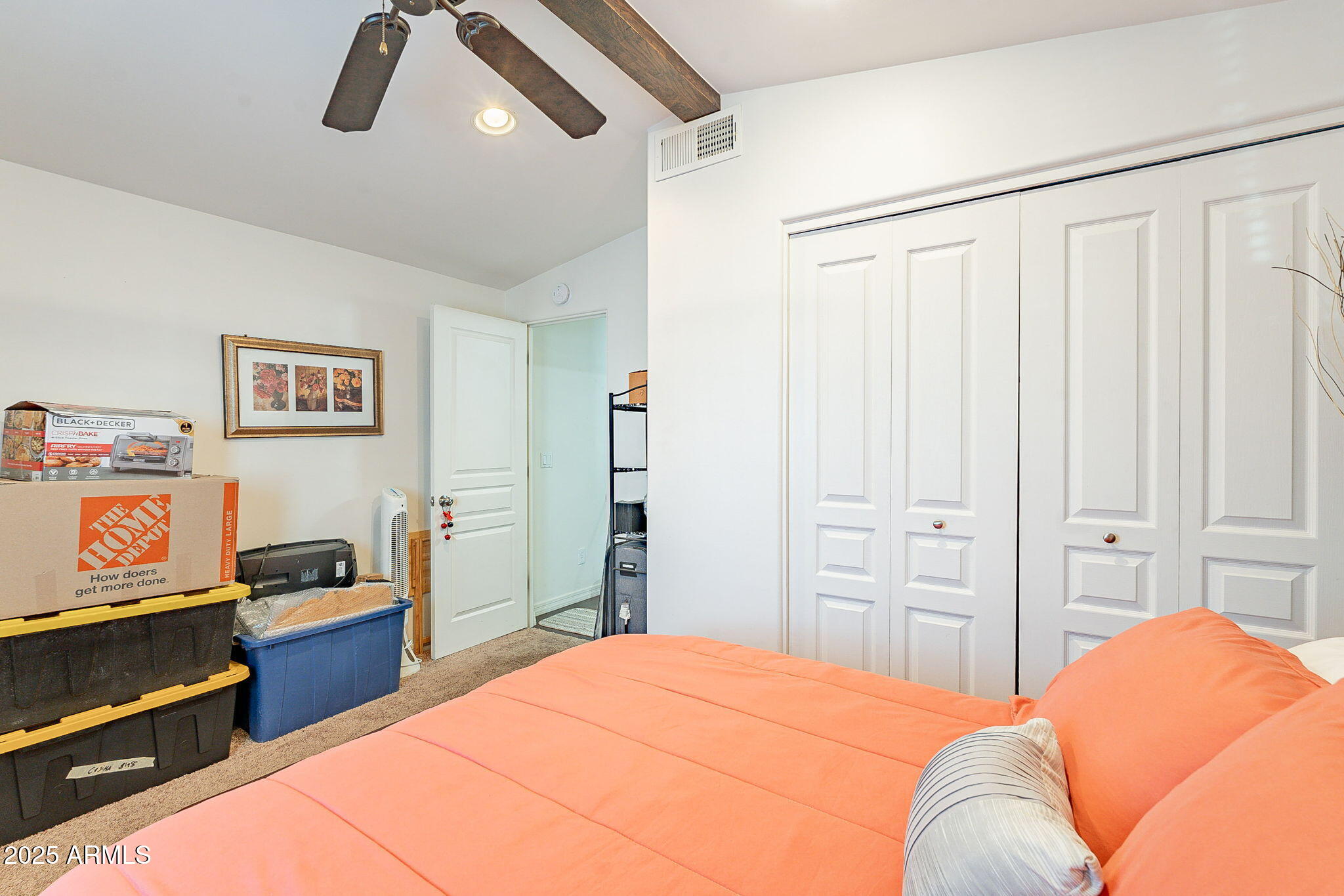 15606 South Gilbert Road, Unit 63 Chandler, AZ 85225 - Photo 18 of 21 a bedroom with a bed and cabinets
