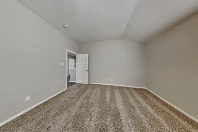 a view of empty room with fan