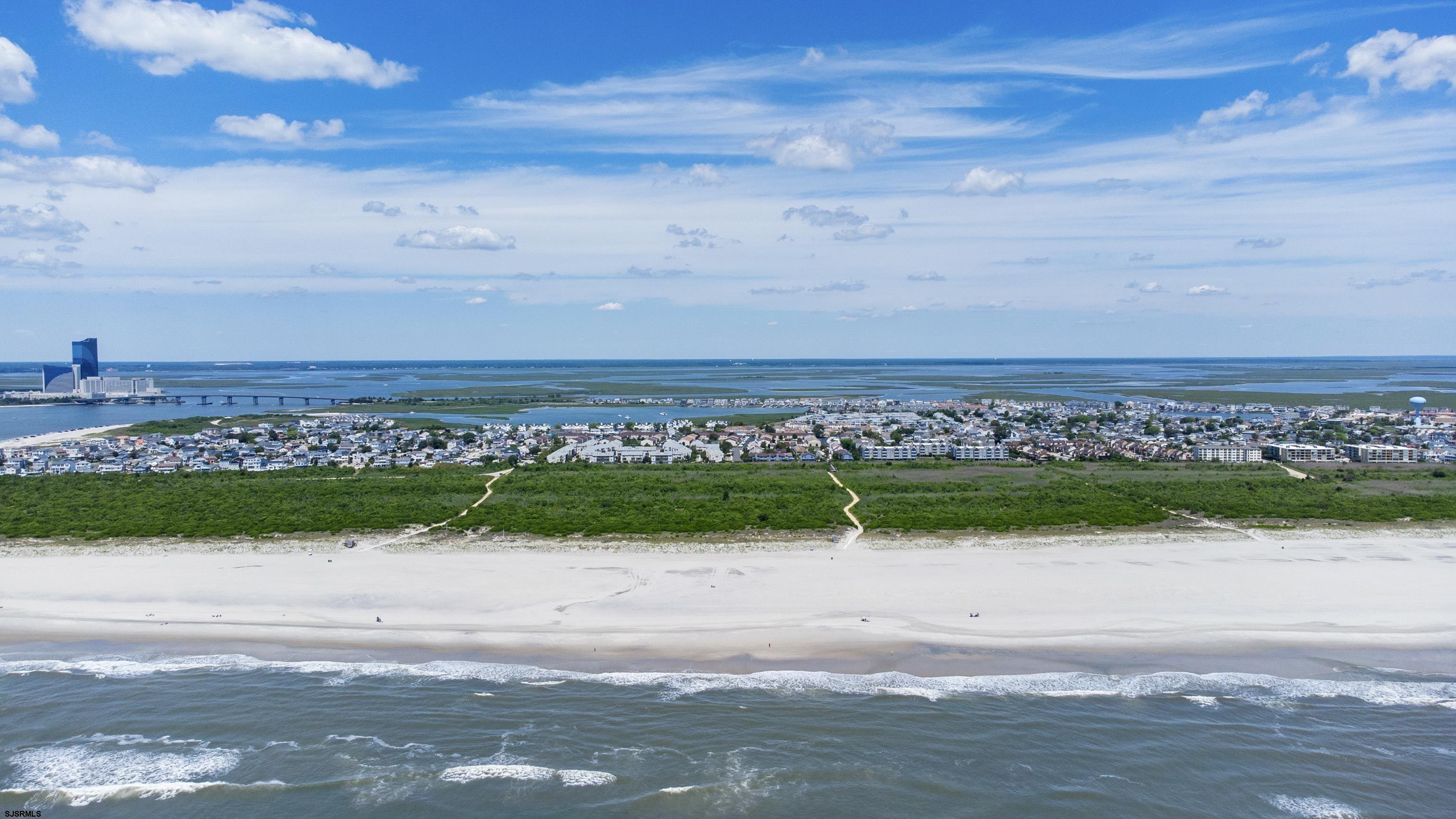 39 Beacon Lane Brigantine, NJ 08203 - Photo 14 of 14 a view of a street with a ocean view