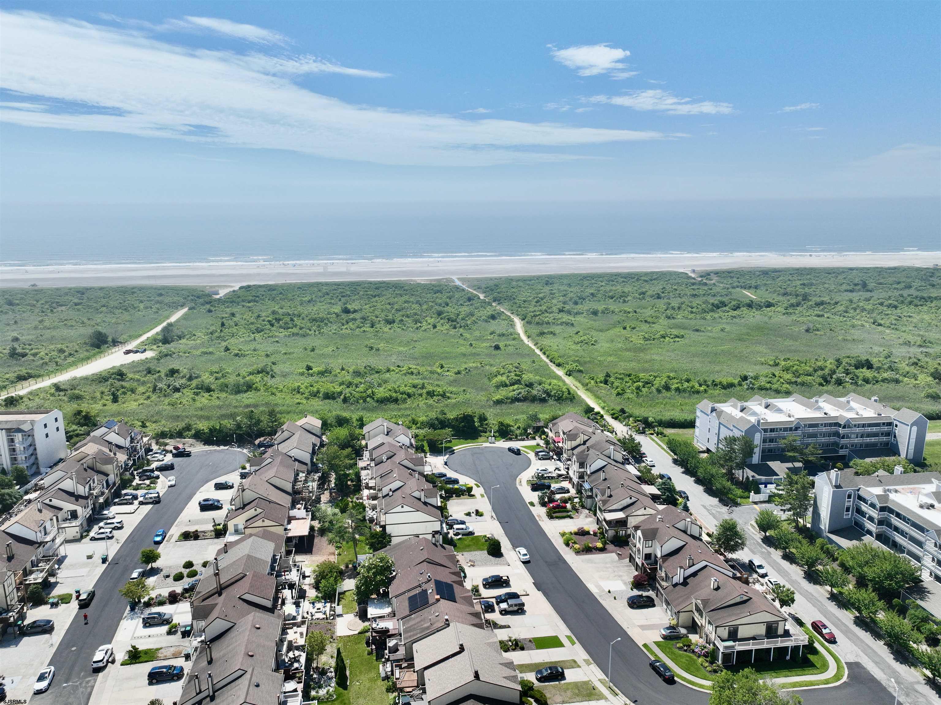 39 Beacon Lane Brigantine, NJ 08203 - Photo 6 of 14 an aerial view of multiple house