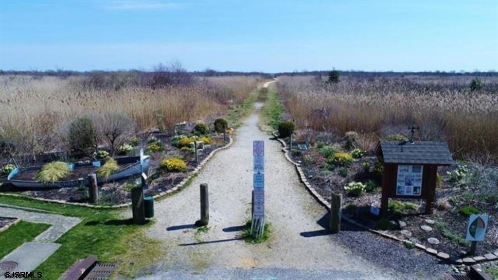 39 Beacon Lane Brigantine, NJ 08203 - Photo 8 of 14 an aerial view of a house with a yard and lake view