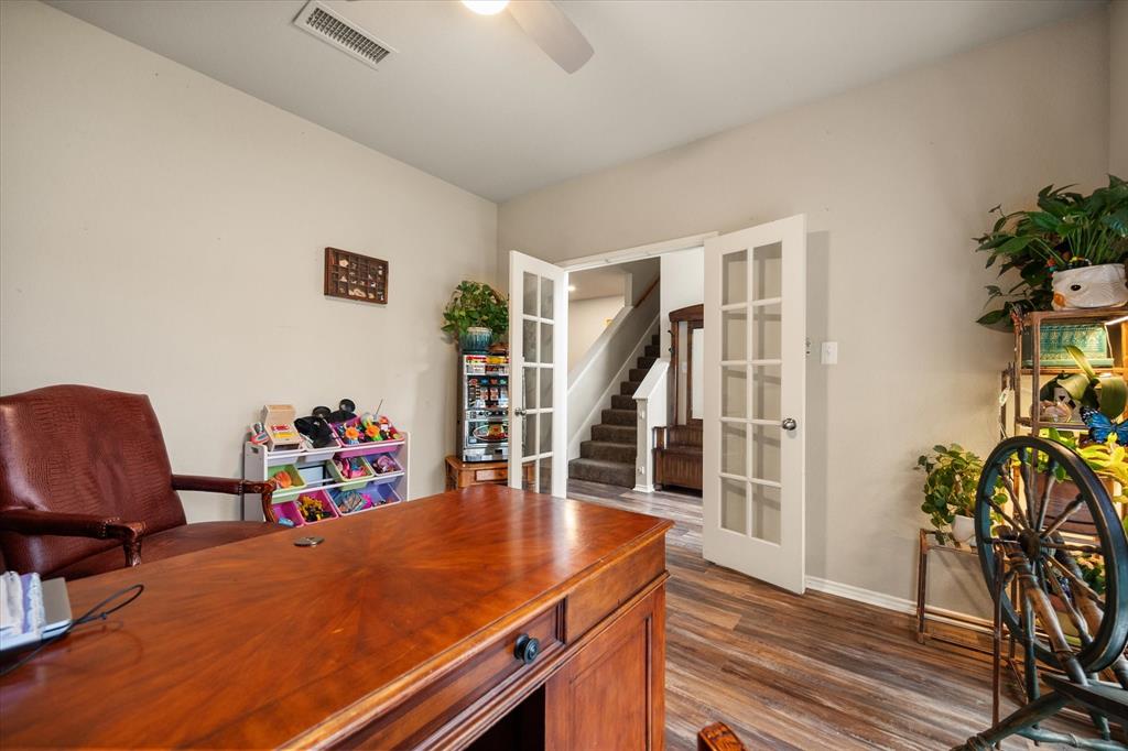 308 Faith Court Burleson, TX 76028 - Photo 15 of 40 a dining room with furniture and wooden floor