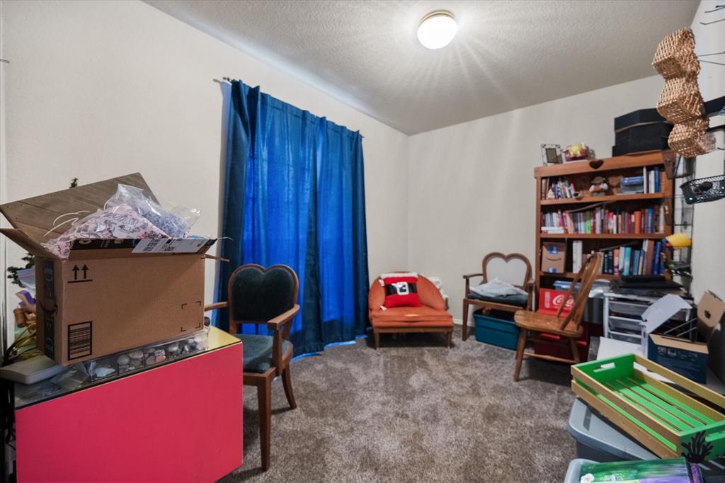 308 Faith Court Burleson, TX 76028 - Photo 22 of 40 a living room with furniture