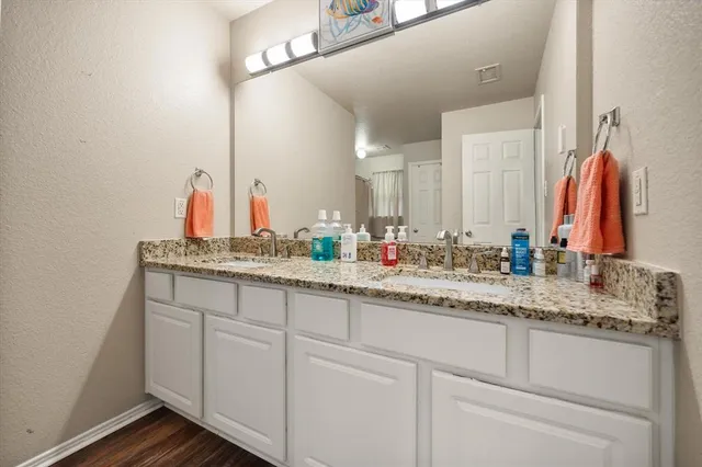 a bedroom with furniture and a bed