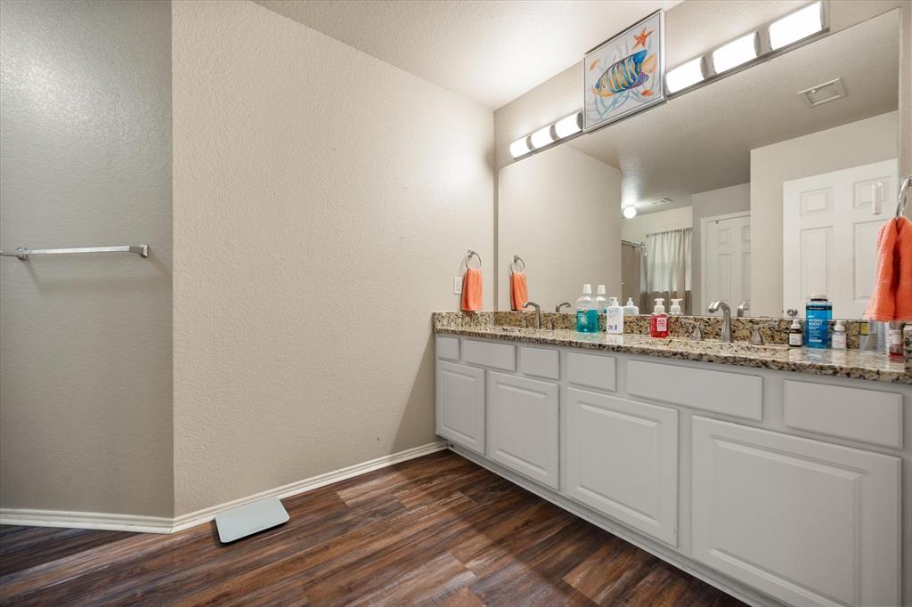 308 Faith Court Burleson, TX 76028 - Photo 26 of 40 a view of a sink and mirror