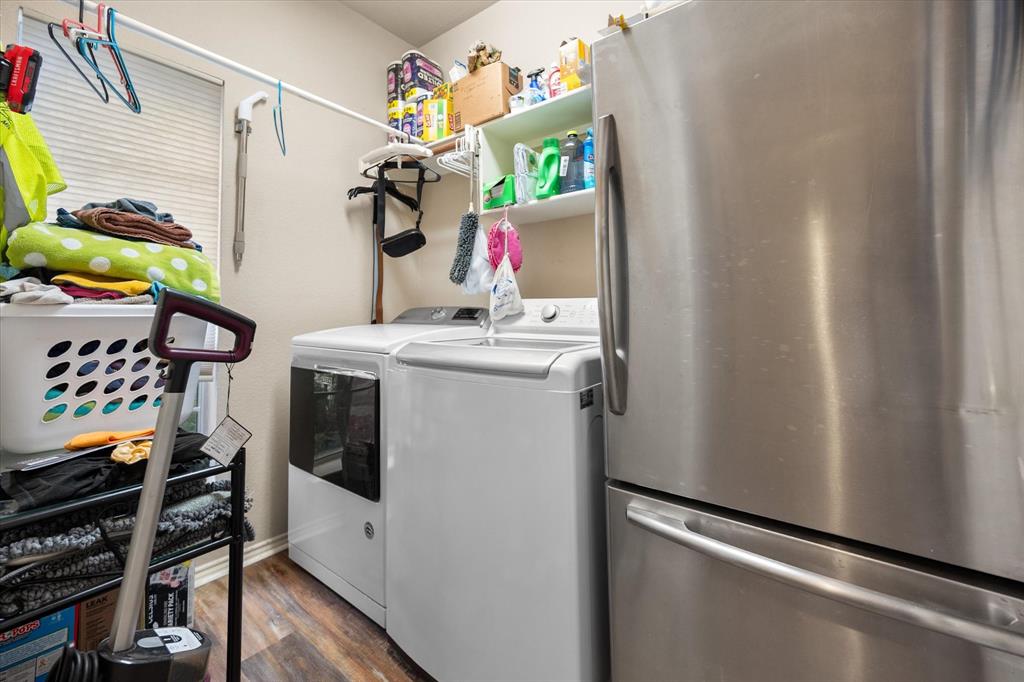 308 Faith Court Burleson, TX 76028 - Photo 31 of 40 a utility room with dryer and washer