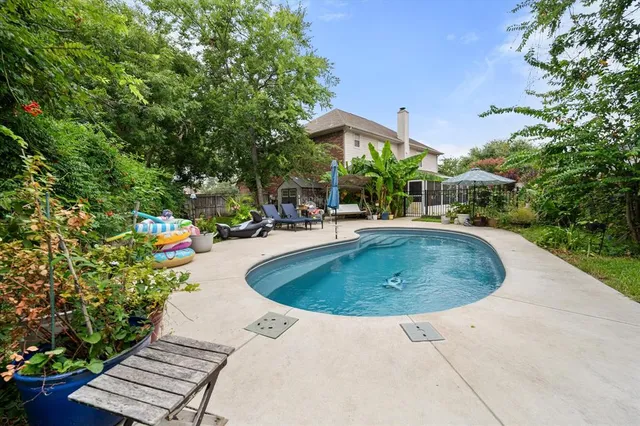 a view of a house with a garden