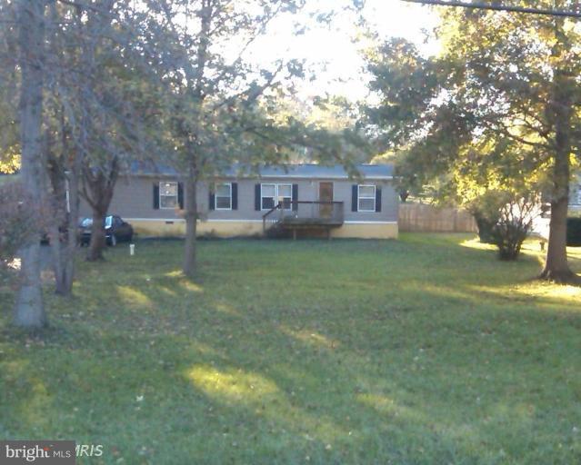 7776 Solomons Island Road Owings, MD 20736 - Photo 1 of 12 Front of your country home