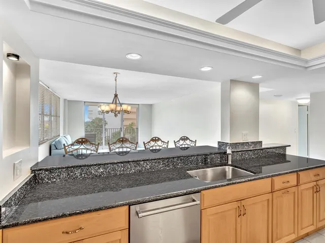 a view of livingroom and dining area with furniture