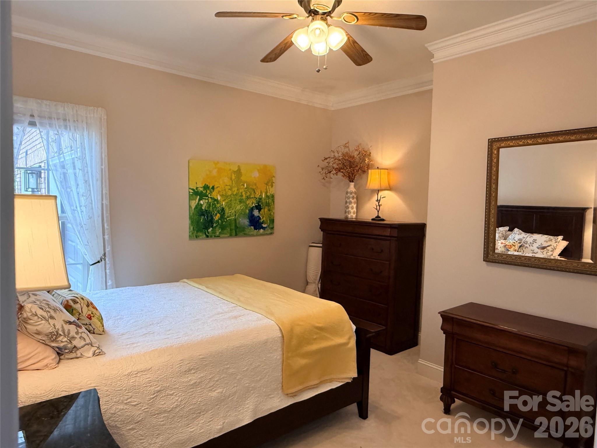 183 Burl Bridges Road Forest City, NC 28043 - Photo 14 of 33 a bedroom with a bed and a dresser