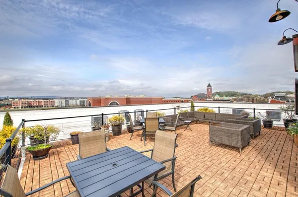 a view of city from terrace with seating space