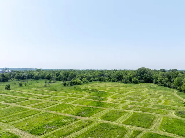a view of a lake with a big yard