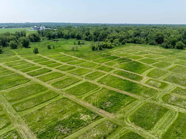 a view of a lake with a big yard
