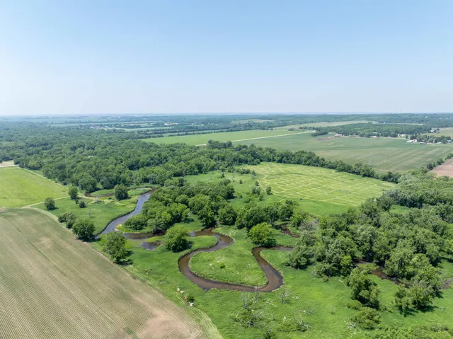 a view of a lake with a big yard