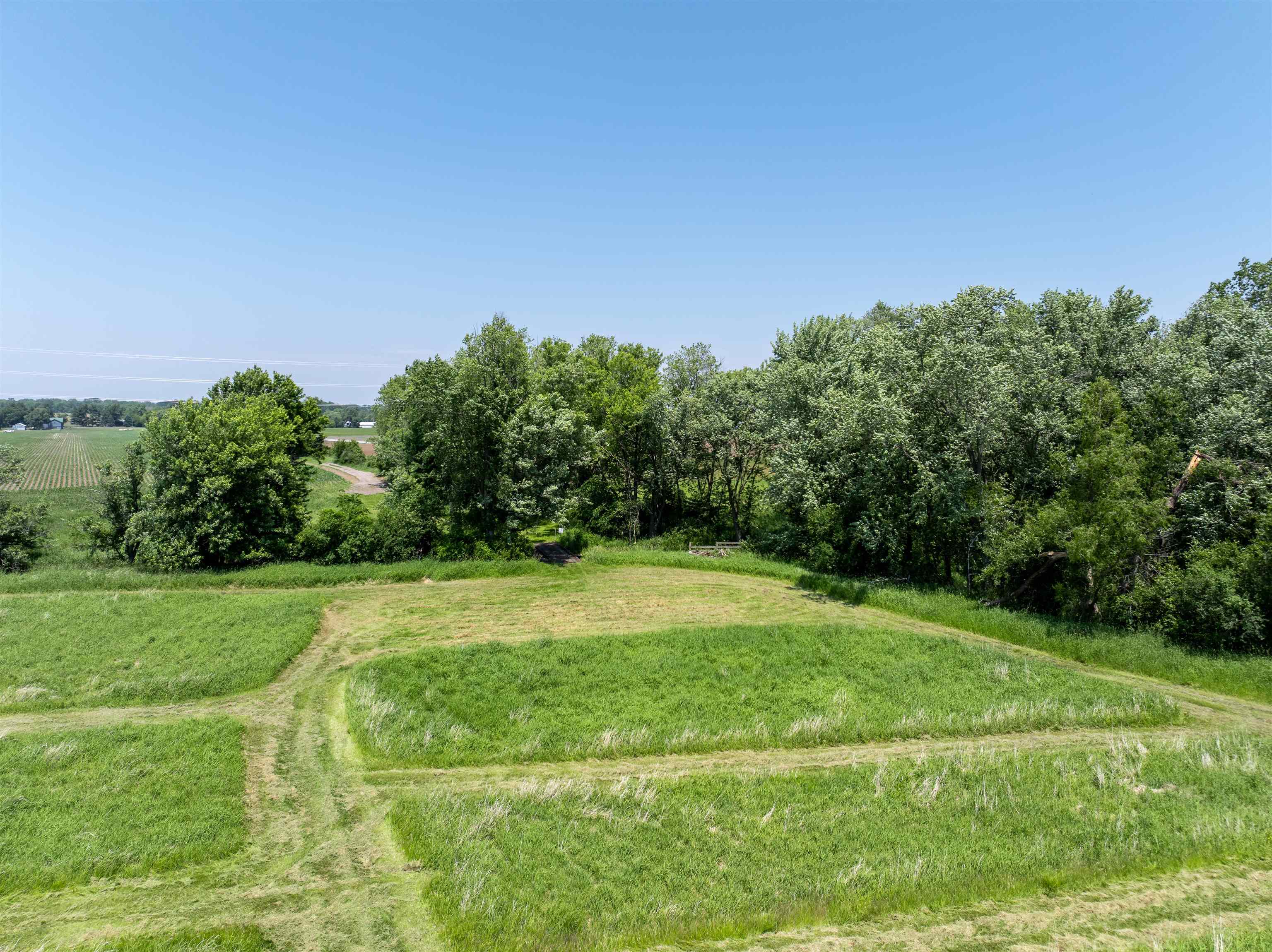 0 Deerpass Road Marengo, IL 60152 - Photo 46 of 61 a view of a grassy field with trees in the background