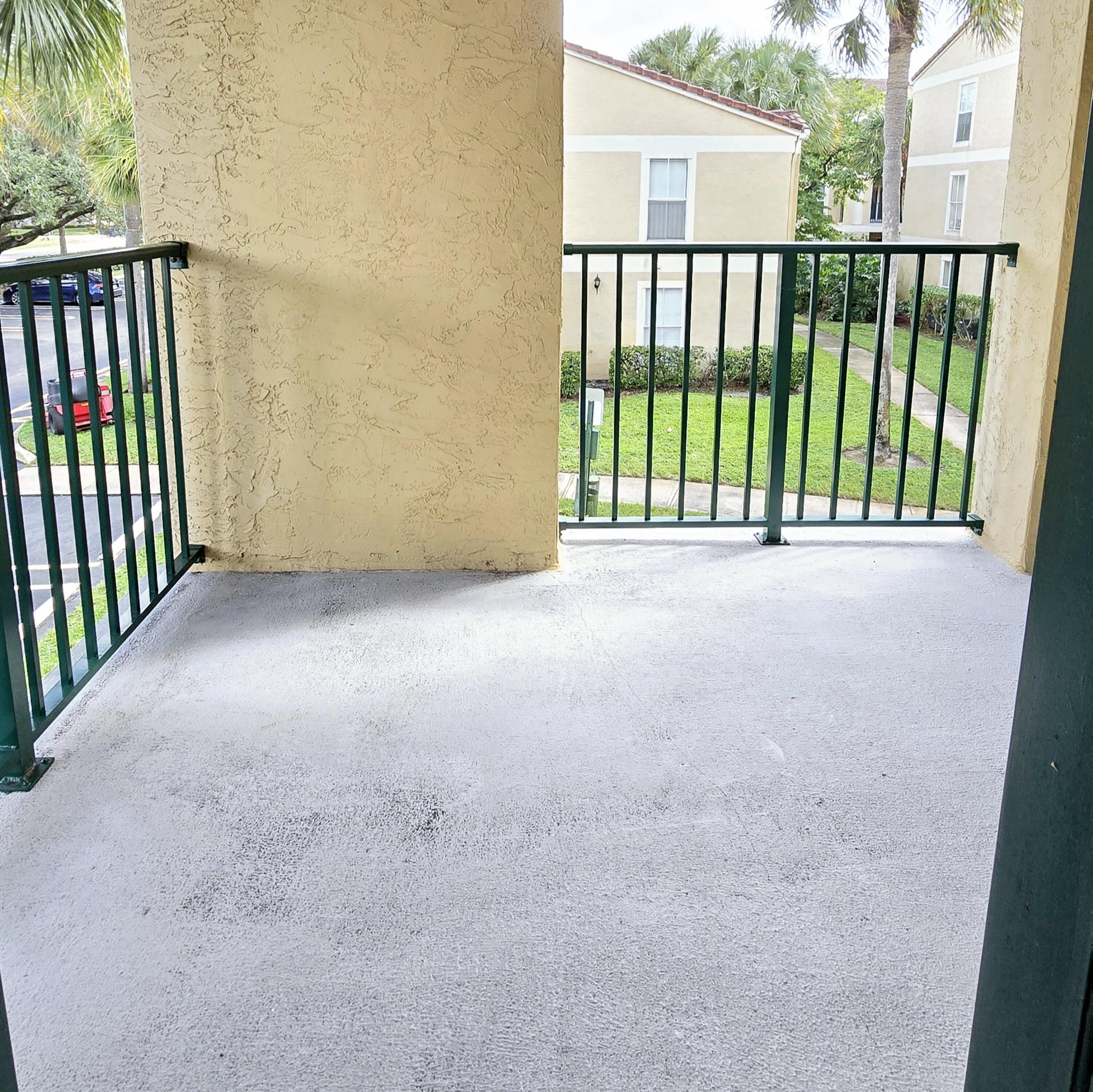 977 Riverside Drive, Unit 220 Coral Springs, FL 33071 - Photo 18 of 23 a view of a balcony
