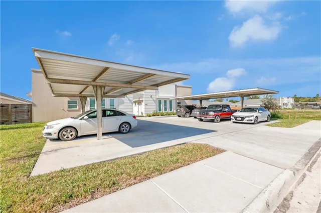 a car parked in the back of a building