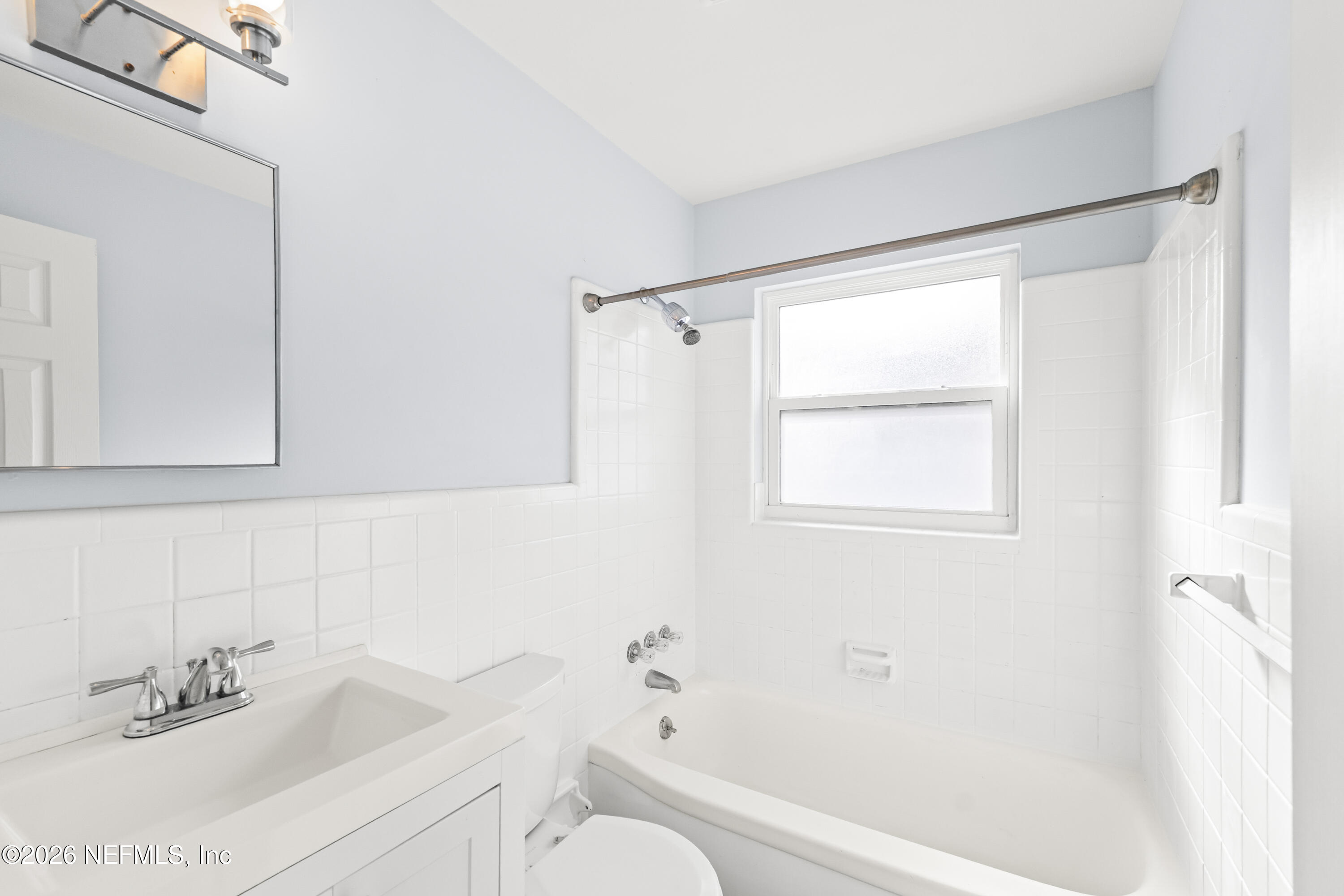 341 9th Street Atlantic Beach, FL 32233 - Photo 16 of 35 a bathroom with a sink toilet and shower