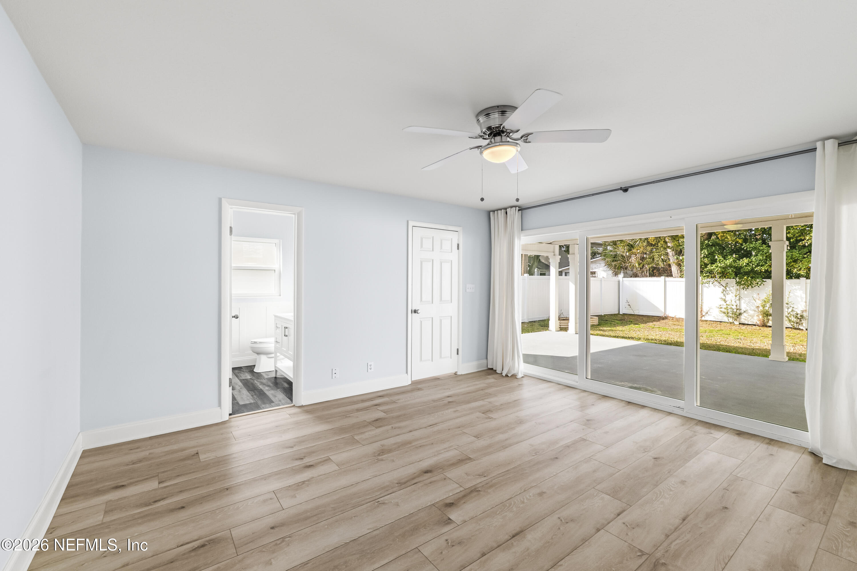 341 9th Street Atlantic Beach, FL 32233 - Photo 19 of 35 a view of an empty room with a window