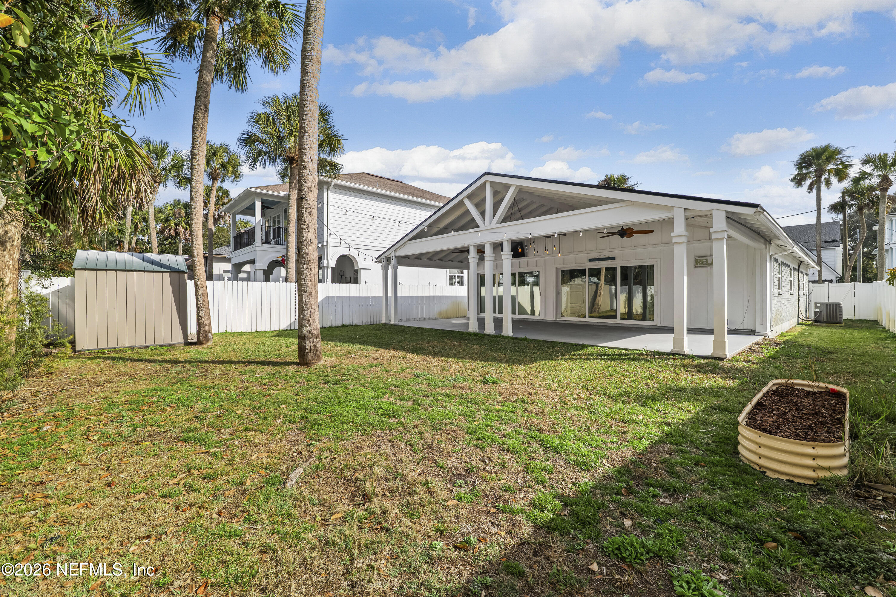341 9th Street Atlantic Beach, FL 32233 - Photo 25 of 35 a house view with a garden space