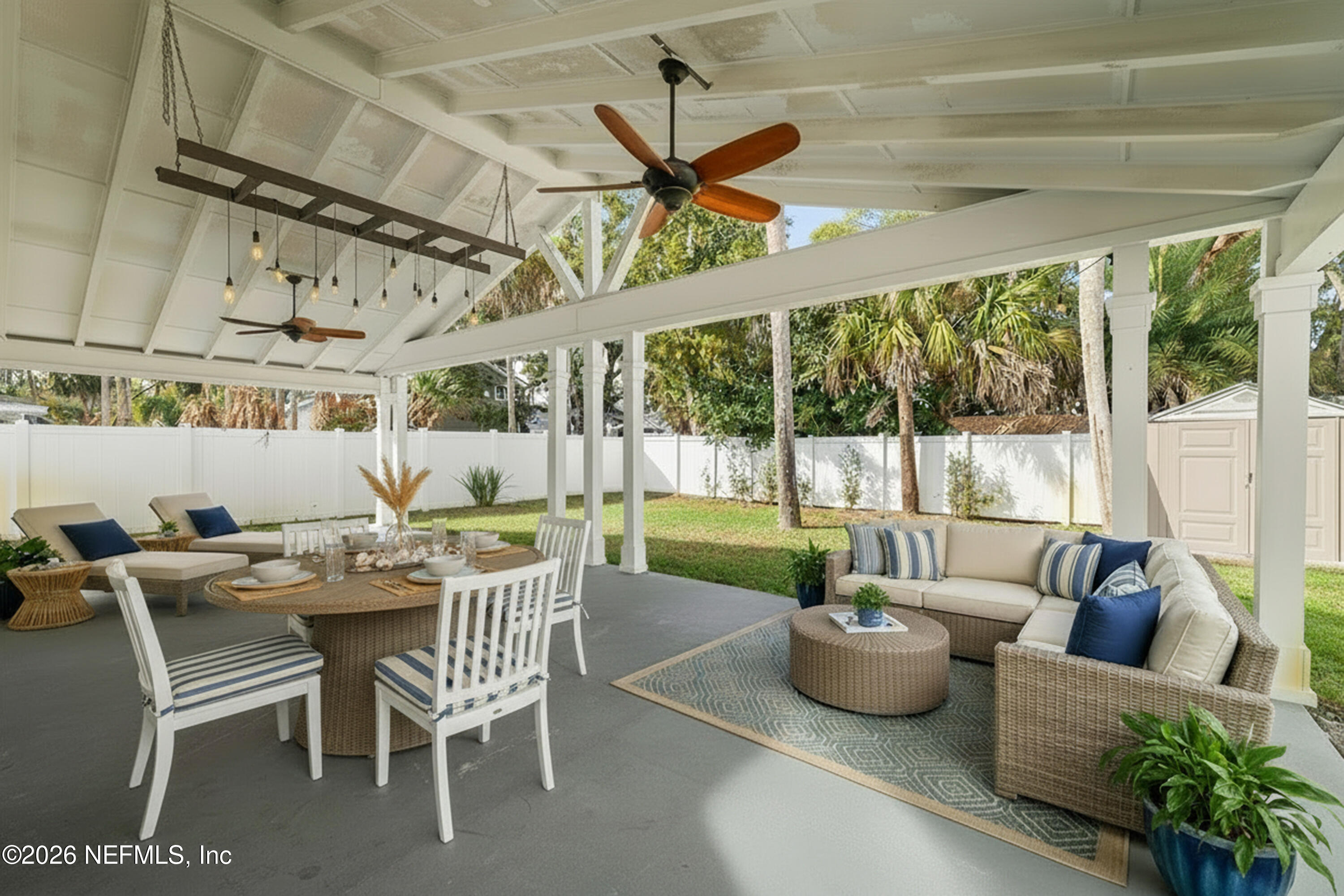 341 9th Street Atlantic Beach, FL 32233 - Photo 32 of 35 a living room with furniture and a large window