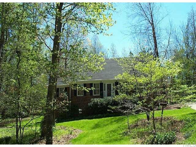 6221 Woodmark Trail Raleigh, NC 27606 - Photo 1 of 1 Beautiful brick 1 1/2 story home almost acre lot.