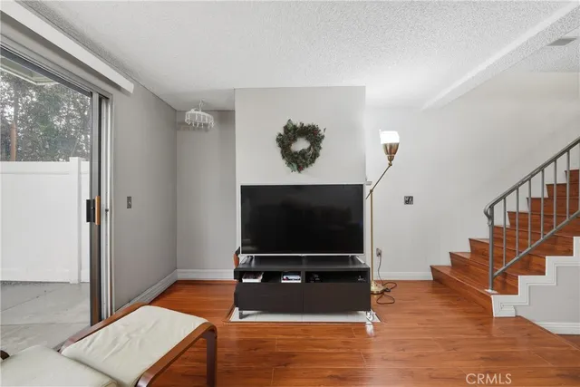 a bedroom with a bed furniture and a window