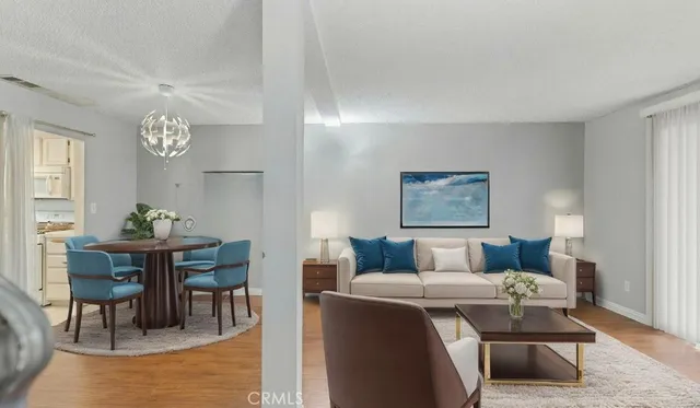 a living room with furniture and a table