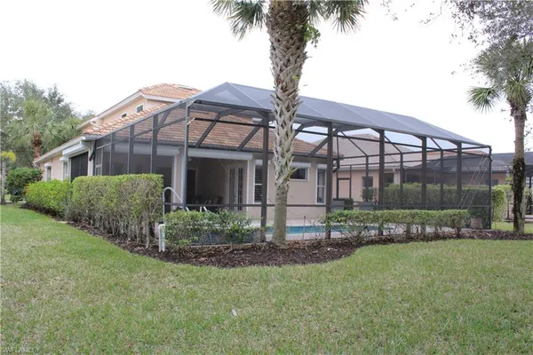 a view of a lake with a yard