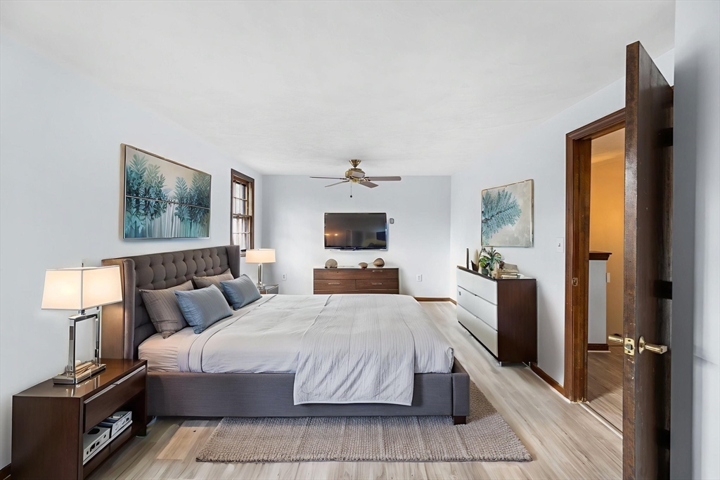 17 Blackstone Road Billerica, MA 01862 - Photo 14 of 32 a bedroom with a bed and a flat screen tv