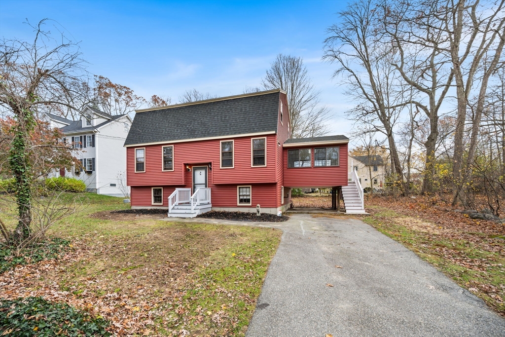 17 Blackstone Road Billerica, MA 01862 - Photo 2 of 32 a view of a house with a big yard and large tree