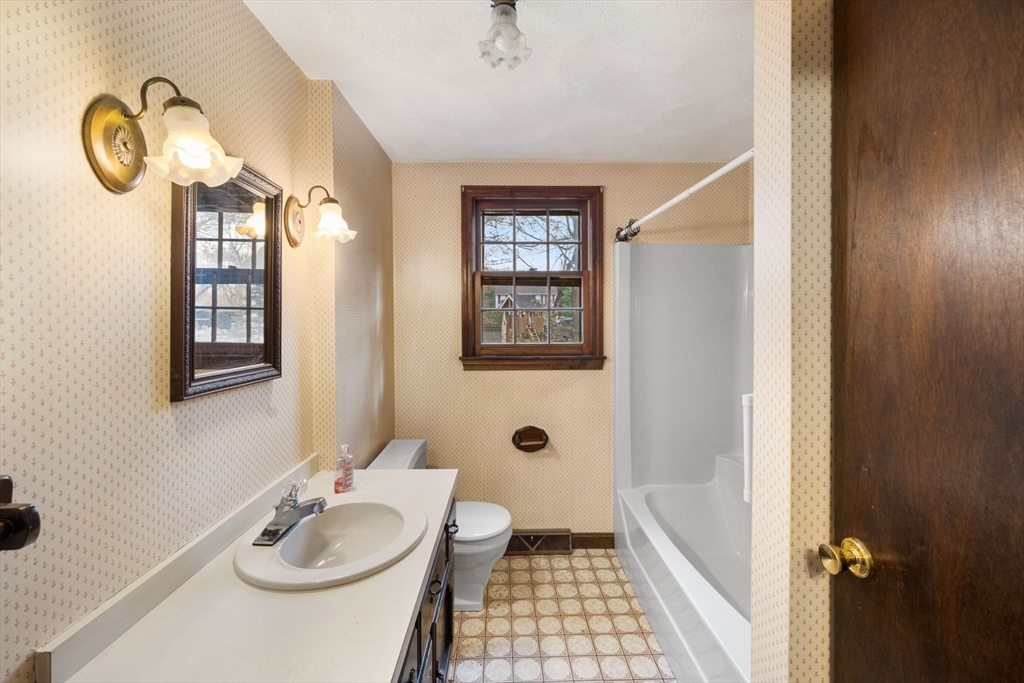 17 Blackstone Road Billerica, MA 01862 - Photo 24 of 32 a bathroom with a sink and a mirror