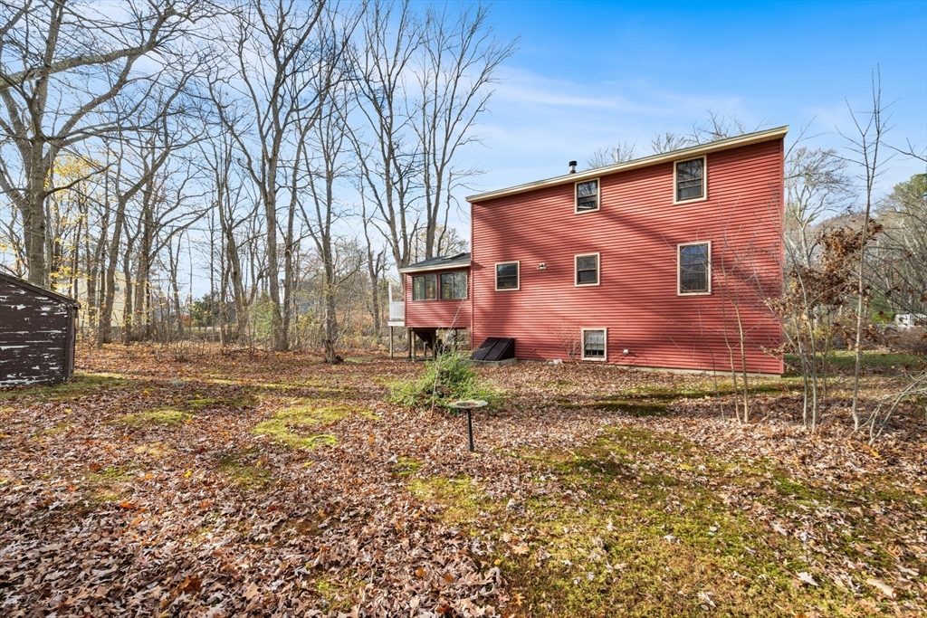 17 Blackstone Road Billerica, MA 01862 - Photo 4 of 32 a view of a backyard with large trees