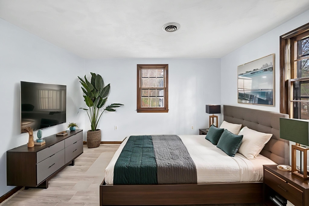17 Blackstone Road Billerica, MA 01862 - Photo 10 of 32 a bedroom with a large bed and a flat screen tv
