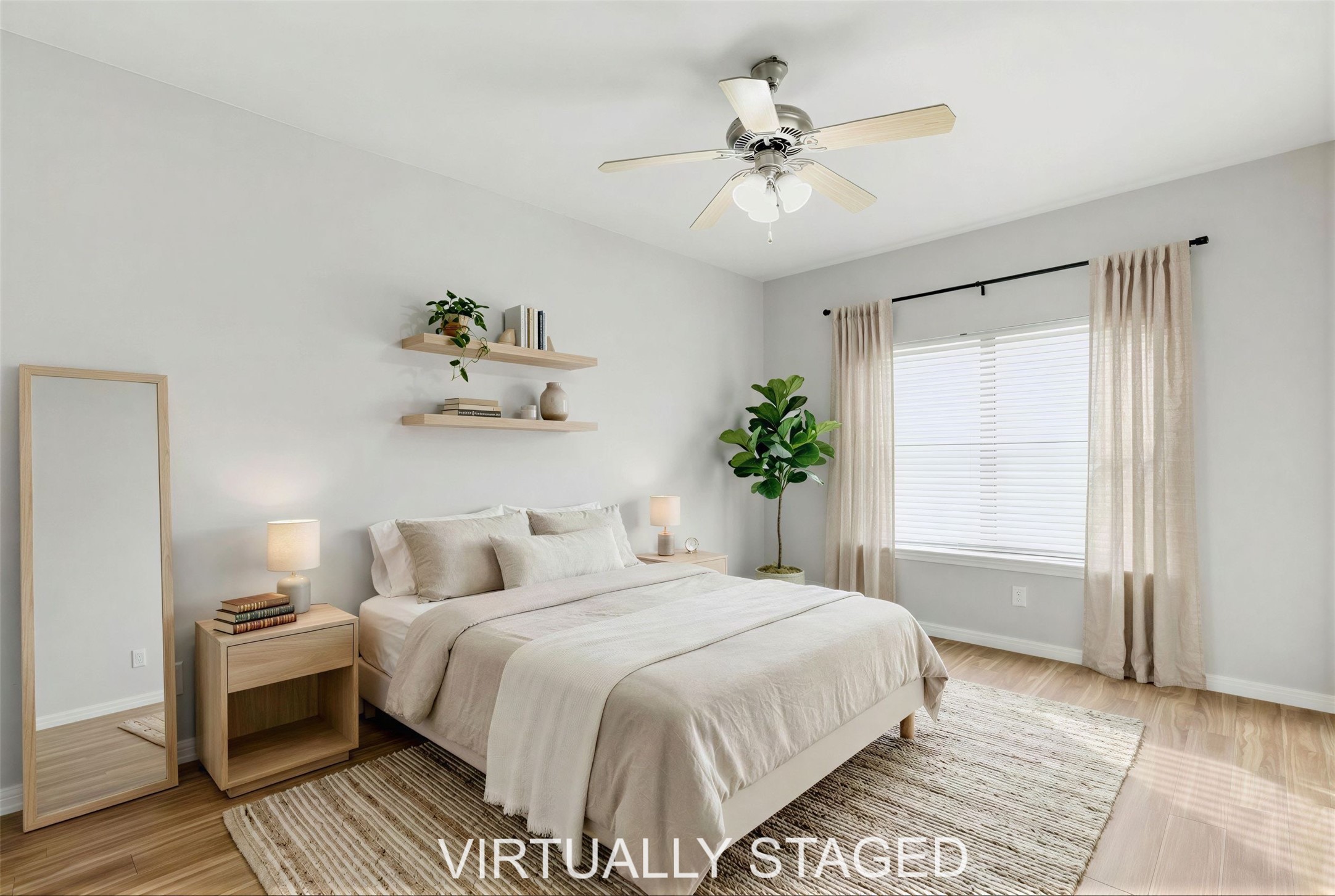 2502 Leon Street, Unit 414 Austin, TX 78705 - Photo 15 of 21 a bedroom with a large bed and a chandelier