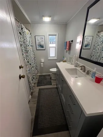 a bathroom with a shower curtain