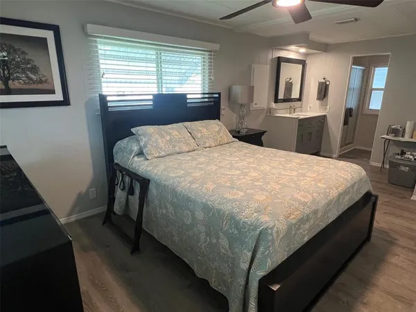 a bathroom with a double vanity sink and mirror