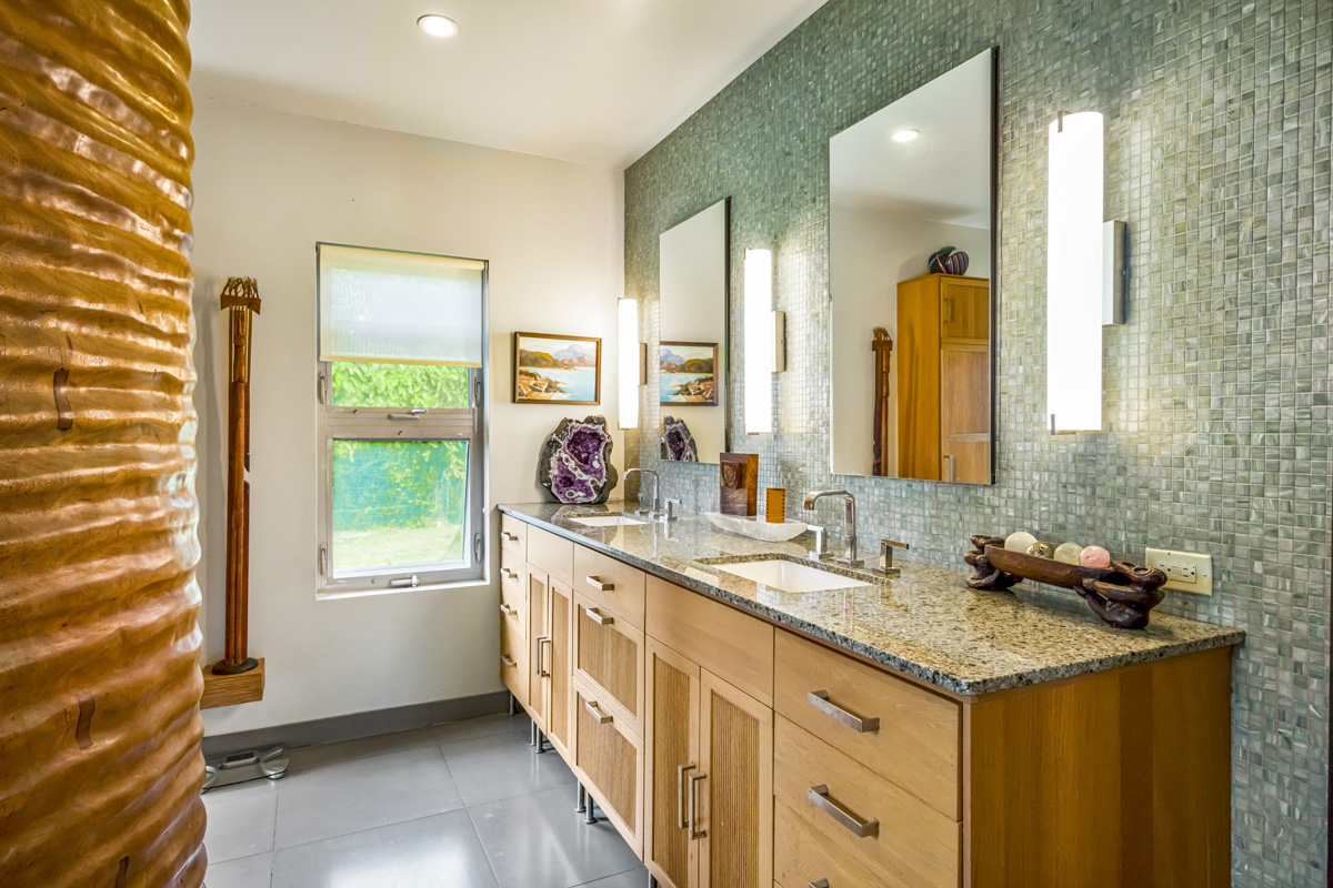 12-7124 Kalapana Kapoho Beach Road Pahoa, HI 96778 - Photo 11 of 30 a bathroom with a granite countertop sink and a mirror