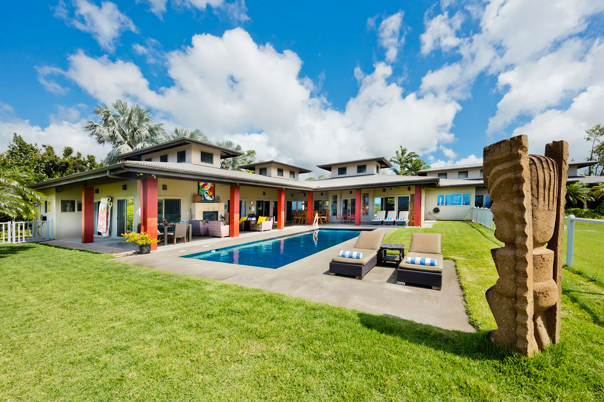 12-7124 Kalapana Kapoho Beach Road Pahoa, HI 96778 - Photo 15 of 30 a front view of house with yard outdoor seating and barbeque oven