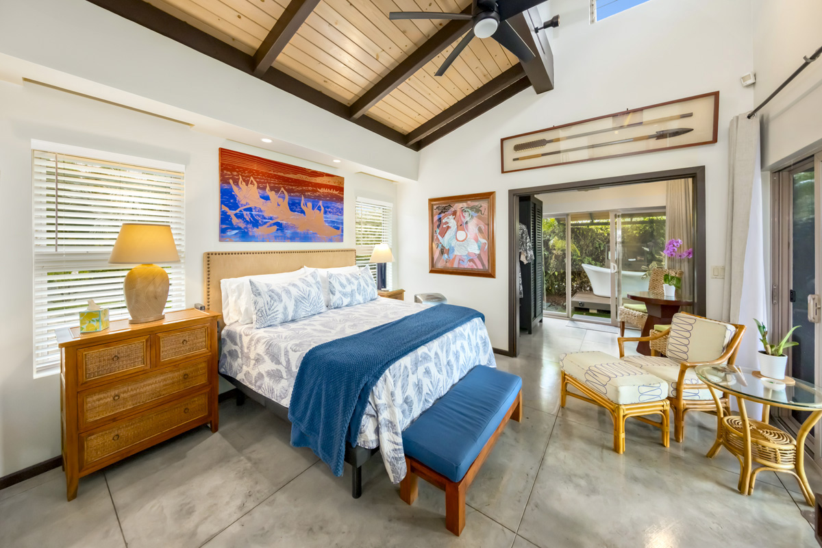 12-7124 Kalapana Kapoho Beach Road Pahoa, HI 96778 - Photo 19 of 30 a bed room with a bed and a chair