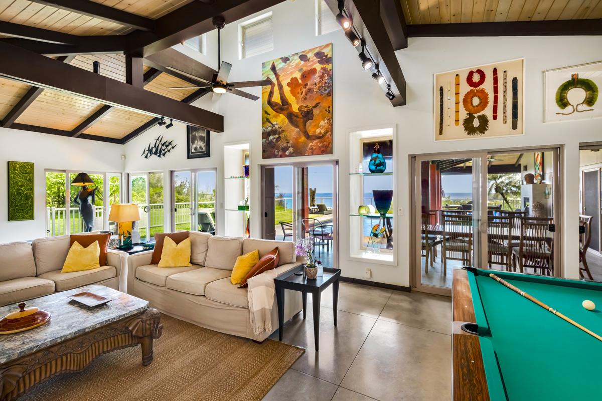 12-7124 Kalapana Kapoho Beach Road Pahoa, HI 96778 - Photo 7 of 30 a living room with stainless steel appliances furniture and a large window