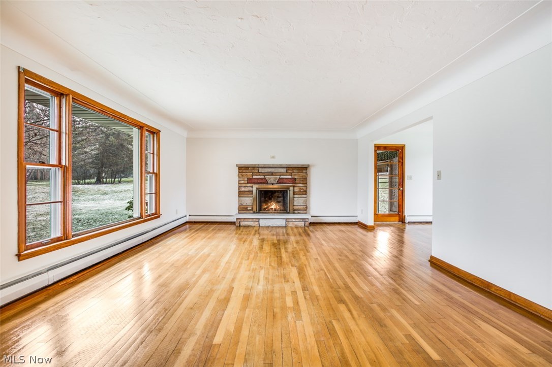 12225 Bean Road Chardon, OH 44024 - Photo 3 of 27 Living Room with beautiful wood floors