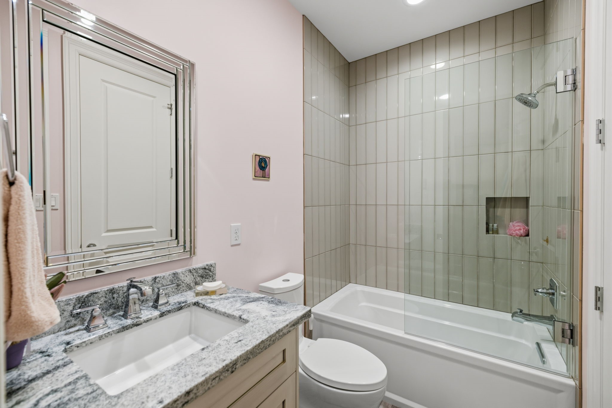 6918 Comanche Bend Montgomery, TX 77316 - Photo 42 of 50 One of the four full bathrooms this home offers, featuring higher-end tubs, quality fixtures, upgraded toilets, and a well-designed layout that reflects the attention to detail found throughout the home.