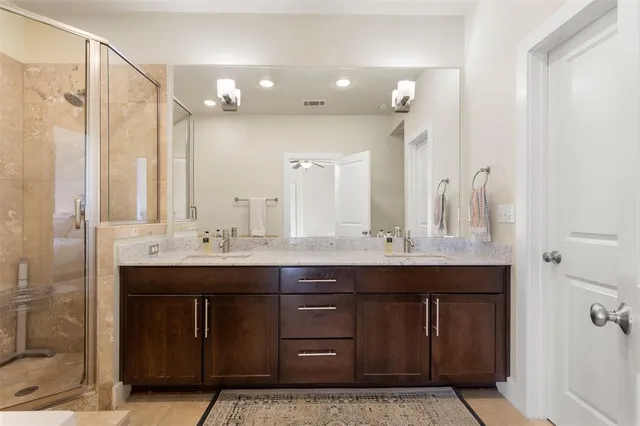 a balcony with furniture and a potted plant