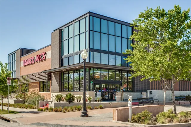 a view of path along with retail shop and buildings