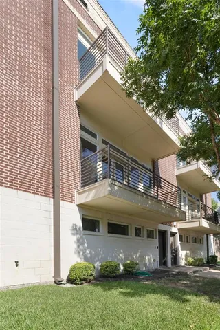 a front view of a building with street view