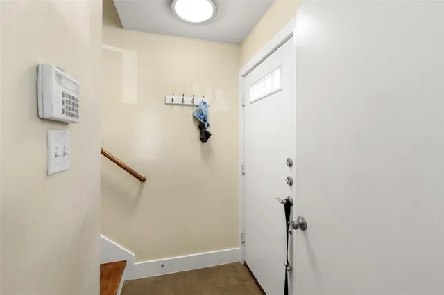 a front view of a house with a glass door